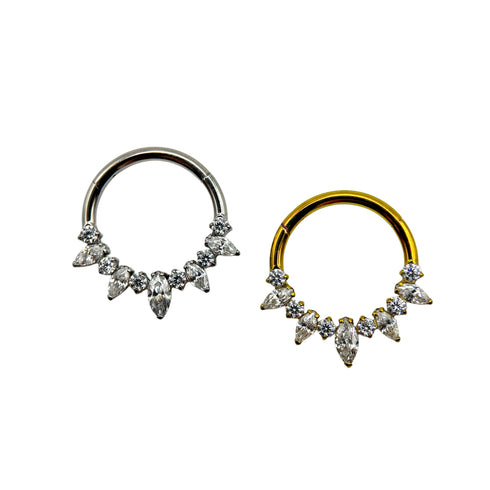 Titāna marķīza un apaļa dārgakmens gredzens