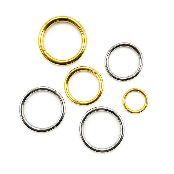 Titanium clicker ring