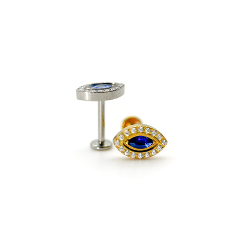 Titanium gem celeste eye labret piercing